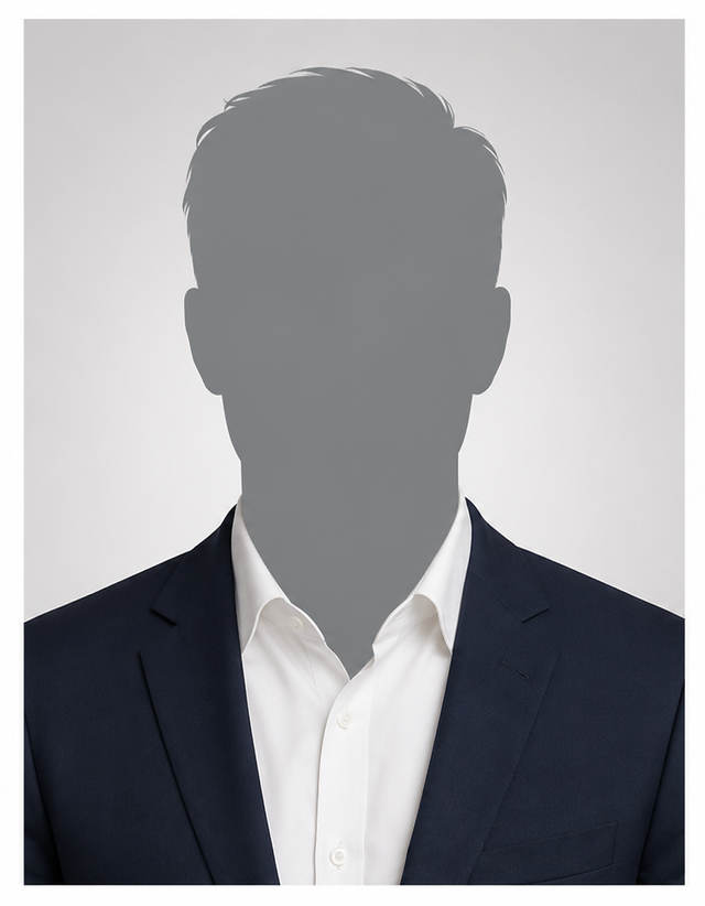 Silhouette eines Mannes im dunklen Anzug mit weißem Hemd, Gesicht unkenntlich.